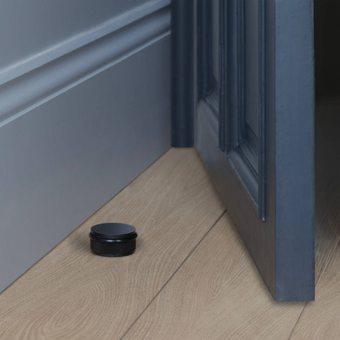 Heavy Duty Black Anodised Metal Door Stop with Diamond-Cut Knurling and Rubber Buffer - BUSTER + PUNCH