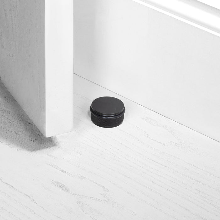 Heavy Duty Black Anodised Metal Door Stop with Diamond-Cut Knurling and Rubber Buffer - BUSTER + PUNCH